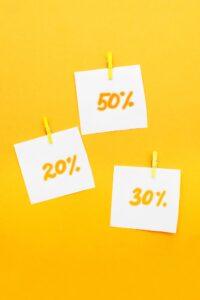 discount paper stickers on an orange background